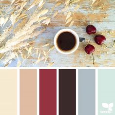 an autumn color scheme with coffee, cherries and dried grass in shades of brown