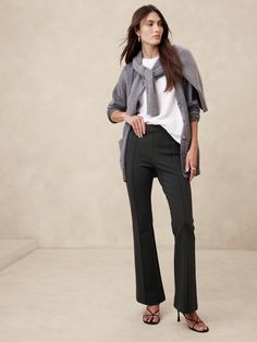 This flare-leg pant is designed for comfort, cut from our Everywhere Ponte fabric.   We developed this special Ponte de Roma, enhancing its softness with special stretch fibers that create a smooth, supportive fit that always looks polished.   4-way Stretch Flare Fit: High-rise (10").  Slim through the hip and thigh with a flared leg.  Full length.  Sustainability: Made with Birla Livaeco™ viscose, a fiber derived from renewable wood resources and sourced from responsibly managed forests.  Birla Livaeco™ viscose is manufactured using a stringent closed-loop process that significantly reduces carbon emissions and water consumption as compared to generic viscose.  Pull-on design with concealed elastic at the waist.  No pockets.  Pin-tuck stitch detail creates the look of a trouser crease.  U