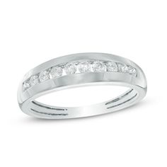 a white gold wedding ring with channeled diamonds