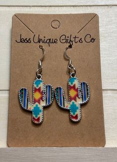 Add a pop of Southwest flair to your style with these stunning Southwestern earrings! Handcrafted with vibrant colors and intricate patterns, these earrings are perfect for adding a touch of bohemian charm to any outfit. Whether you're heading to a music festival or a summer barbecue, these earrings will be sure to make a statement. Light up your look with a pair of these unique Southwestern earrings today! Bohemian Colorful Dangle Jewelry, Bohemian Dangle Jewelry With Colorful Design, Bohemian Drop Earrings With Colorful Design, Bohemian Colorful Earrings For Gift, Colorful Nickel Free Bohemian Jewelry, Southwestern Style Drop Earrings As Gift, Colorful Bohemian Jewelry With Matching Earrings, Bohemian Colorful Drop Earrings, Southwestern Style Drop Earrings