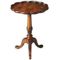 an antique wooden table with two legs and a tray on the top that is turned upside down