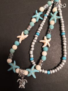 Handmade Sea Star & Turtle Anklet – Boho Peak Beach Turquoise Necklace With Starfish Charm, Turquoise Necklace With Starfish Charm For Beach, Turquoise Necklaces With Starfish Charm For Beach, Ocean-inspired Starfish Beaded Necklaces, Bohemian Starfish Anklets As A Gift, Beach Season Strand Anklet With Starfish Charm, Bohemian Strand Anklet With Starfish Charm, Blue Anklets With Starfish Charm For Gift, Blue Anklets With Starfish Charm As Gift