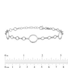 Add a little drama with this polished circle link bracelet. Hollow sterling silver Open circle links - three smaller and one larger - create the repeating pattern 4.7mm width 6.0 inches with 1.0-inch extender; lobster claw clasp Modern Sterling Silver Bracelets With Rolo Chain, Adjustable Round Chain Bracelet With Solid Links, Modern Round Bracelets With Adjustable Chain, Classic Round Chain Bracelet With Extender, Sterling Silver Bracelet With Solid Round Links, Modern Sterling Silver Round Chain Bracelet, Modern Sterling Silver Bracelet With Rolo Chain, White Gold Rolo Chain Bracelet, White Gold Round Rolo Chain Bracelet