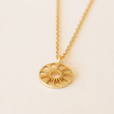 The Daisy Necklace the perfect addition to your favorite necklace stack or a sweet gift for the favorite guy or gal in your life. Designed in house by our very own Sunshine Studios, we're so proud of these gold vermeil necklaces that combine our love for 70's beach culture and dainty jewelry. Everyday 14k Gold Necklaces With Flower Charm, Everyday 14k Gold Necklace With Flower Charm, Yellow Gold Charm Necklaces With Flower Charm, Everyday Gold Plated Jewelry With Flower Charm, Everyday Spiritual Yellow Gold Charm Necklace, Minimalist Yellow Gold Necklace With Flower Charm, Everyday Yellow Gold Flower Pendant Necklace, Everyday Yellow Gold Necklace With Flower Pendant, Everyday Gold Charm Necklaces With Flower Charm