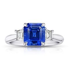 3.18ct Emerald cut light blue sapphire with trapezoid step cut diamonds 0.46ctw set in a platinum ring. Blue Sapphire Diamond Ring, Light Blue Sapphire, Diamond Rings With Price, Platinum Diamond Rings, Sapphire And Diamond Ring, Blue Sapphire Diamond, Dream Engagement Rings, Step Cut, Platinum Ring