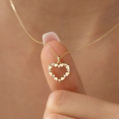 14k Gold Tiny Heart NecklaceDetails Available in 14k Gold, 14k Rose Gold, and 14k White GoldTotal Weight: 2.9 GrColor Selection: Yellow, Rose, WhiteChain: 14k Gold and 45 cm (18 inches) *Model in the photo wears 18 inches (45 cm) chain.GiftingEach design will arrive artfully presented in our branded gift boxes wrapped in a signature ribbon. Production & Delivery Production: 5 - 7 business days Delivery: 1 - 3 business days worldwide via Express Delivery We’re here to help with style advice, a se Tiny Heart Necklace, Style Advice, Tiny Heart, Yellow Rose, Jewelry Pouch, Gift Boxes, Fashion Advice, Heart Necklace, Solid Gold