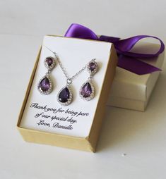 "This beautiful set of double purple plum tear drop CZ earrings and necklace is gorgeous to wear, great for bridal party, mothers and bridal gifts. They are made of AAA grade tear drop cubic zirconia deep purple crystals. Available in high quality Rose gold and White gold plated settings. These are elegant to wear and are nickel, cadmium and lead free, and are hypoallergenic to wear. Different CZ pendant color available (see color chart in last picture), please leave a note for color number at c Elegant Teardrop Jewelry Sets For Gift, Elegant Lavender Teardrop Jewelry, Elegant Purple Jewelry For Wedding, Purple Teardrop Necklace For Wedding, Elegant Purple Jewelry Sets For Formal Occasions, Cubic Zirconia Jewelry Sets With Drop Earrings For Gifts, Purple Cubic Zirconia Jewelry Sets For Gift, Purple Drop Jewelry For Party, Purple Cubic Zirconia Jewelry Sets As Gift