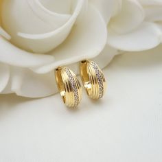 Stunning solid 14k yellow gold huggies earrings. This unique design is perfect for everyday and everywhere. Elegant, shint and everlasting. Huggies earrings sit close to the earlobe and will also fit in girls. No need to take off to sleep, to shower to run, etc. 14k gold will not tarnish or rust. Perfect gift.  Materials: 14k gold , Cubic zirconia. Diameter: 14mm Thickness: 5mm Weight: 2.9 grams 14k stamped (585) Brand new  Fast shipping Gift box included 💓 Briza Collections is a small family b Earrings Design Gold New Model, 2 Grams Gold Ear Rings, Tarnish Resistant Huggie Diamond Earrings For Anniversary, 14k Gold Huggie Earrings With Vvs Clarity Diamonds, Anniversary Tarnish-resistant Huggie Diamond Earrings, Gold Diamond Earrings For Anniversary, Gold Plated Hallmarked Huggie Earrings, Tarnish Resistant Round Cut Earrings For Anniversary, Classic Huggie Hoop Earrings With Diamond Cut