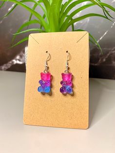 These adorable gummy bear earrings are perfect for your favorite kid OR adult in your life! They are fun, colorful, and super cute. Earring hooks are fine for kids and sensitive ears. Novelty Multicolor Earrings For Birthday, Playful Purple Earrings For Gift, Playful Purple Earrings For Gifts, Kawaii Hypoallergenic Jewelry For Birthday, Kawaii Hypoallergenic Jewelry For Birthdays, Cute Resin Jewelry For Birthday, Cute Resin Jewelry For Birthdays, Sweet Multicolor Earrings For Gift, Playful Nickel-free Earrings For Birthday