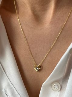 Beautiful minimalist heart beats for you 💛 Get this beautiful minimalist jewelry made with the quality of perfect elements✨ You can choose 925K Sterling Silver with the options of Gold, Rose Gold or White Gold colors. High quality jewelry for everyone 🤍  Details * 925K Sterling Silver Option → 14K Gold, Rose Gold or White Gold plated * Chain length is approximately 18 inches (16+2 in extender) / 45 cm (40+5 cm extender) * Time is everything! You will receive your package as soon as possible 🚚  * We care about the quality of metal to make sure it will last for a long time * We use enamel technique to color the jewelry and high quality zircons only * There can be tiny differences on each item. Length difference of the chain as well as color changes and shade differences of the stones and Gold Necklace Outfit, Time Is Everything, Valentines Day Necklace, Necklace Outfit, Love Jewelry, Jewelry Minimalist, Minimalist Gifts, Minimalist Designs, Mom Jewelry