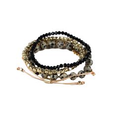 A stack of gold-corded, beaded stretch bracelets in black and cream hues with gold accents. KSF-B-200-WN23-103 Material content: 18k gold plated, nickel free. Glass and acrylic beads. Black And Cream, Beaded Stretch Bracelet, Acrylic Beads, Stretch Bracelet, Ring Bracelet, Black Cream, Stretch Bracelets, Earring Necklace, Gold Accents