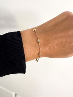 This beautiful silver Stars bracelet has an extender chain as adjusts to fit different wrist sizes. This dainty bracelet looks gorgeous stacked with other bracelets and watch. Simple, delicate and versatile... you'll want in your collection. D E T A I L S *  Available in sterling silver or Crafted in Gold plated 925 sterling silver * Very easy to put on * Adjustable from 16 to19 cm.  * An extender chain means it adjusts to fit different wrist sizes. - we use only the finest quality materials - all components are 100% sterling silver or 18k Gold plated  (Nickel free) - all pieces are designed in our happy studio  All jewelry comes in beautiful packaging, gift ready  Visit our shop www.etsy.com/shop/aranjewels Feel free to contact with us with any questions!  Like us on Facebook! https://www Silver Star Bracelet, Stars Bracelet, Watch Simple, Small Stars, Dainty Bracelet, Star Bracelet, Bracelet Sterling Silver, Dainty Bracelets, Bracelet Silver