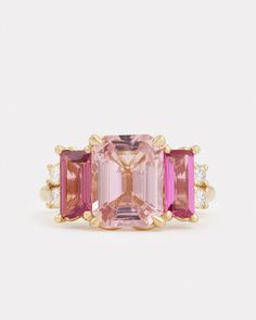 a pink tourmaline and diamond three stone ring