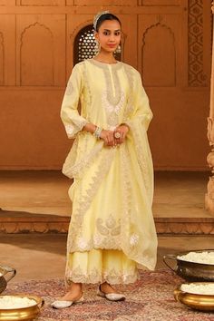 Lemon yellow silk chanderi A-line kurta with kashmiri tilla and parsi gara embroidery. Comes with palazzo and a silk organza dupatta. - Aza Fashions Yellow Silk Kurta For Eid, Unstitched Yellow Slub Silk Sharara, Yellow Slub Silk Salwar Kameez With Dori Work, Yellow Slub Silk Traditional Wear With Gota Work, Yellow Tissue Silk Kurta For Diwali, Yellow Silk Palazzo Set For Wedding, Elegant Yellow Dola Silk Anarkali Set, Yellow Semi-stitched Raw Silk Kurta, Yellow Raw Silk Salwar Kameez With Chikankari Embroidery