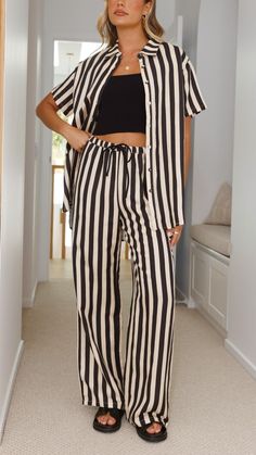 Elevate your loungewear with our Striped Button-Down Shirt Two – Piece Set. Featuring a collared v-neckline, short sleeves, and self-covered buttons, this set pairs perfectly with our matching striped pants. Relaxed fit for ultimate comfort and style. Striped Linen Pants, Daily Dress, Swimwear Cover, Linen Shorts, Striped Linen, Striped Pants, Hoodie Top, Essie, Sweater Jacket