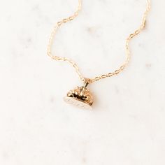 This one-of-a-kind necklace is composed of: Gold filled, Victorian watch fob charm from the late 1800s with hand engraved initials "GFK" on the bottom of the charm. This piece was originally made and sourced in England. This necklace measures a standard 16” on a modern 14k gold filled chain. The fob measures 1” in length and .75" in width. Classic Medallion Necklaces With Charms, Yellow Gold Charms Necklace Keepsake, Antique 14k Gold Necklace With Charms, Heirloom Pendant Locket Necklace With Charms, Heirloom Necklaces With Charms, Heirloom Round Charm Necklaces, Memorial Pendant Jewelry With Charms, Memorial Medallion Jewelry With Charms, White Gold Vintage Charm Pendant Jewelry