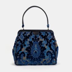 Burnout Velvet Navy Alma Shoulder Bag Carpet Bag of America front Luxury Baguette Bag With Handles For Travel, Luxury Travel Baguette Bag With Handles, Evening Satchel Bag With Dust Bag Included, Evening Satchel With Dust Bag Included, Travel Tote Baguette Bag With Detachable Handle, Elegant Baguette Bag With Top Carry Handle For Travel, Evening Tote Bag With Detachable Strap, Evening Tote With Detachable Strap, Top Handle Baguette Bag For Travel