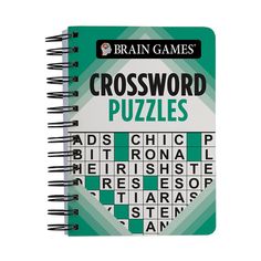 a spiral notebook with the words crossword puzzles printed on it, in front of a white background