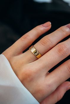 This gold band is minimal, without lacking in substance, and beautifully hand-crafted. I lightly hammer these rings to create a slightly faceted, shine. You can choose a more matte finish or a more heavily hammered finish at checkout. These rings are perfect for all genders! This ring is made out of solid 14k gold. These wide rings are perfectly lightweight and comfortable for everyday wear which makes them amazing wedding bands. Choose BRUSHED MATTE , FACETED, or PEBBLED Finish Texture at check Hammered Gold Wedding Band, Delicate Gold Ring, Hammered Wedding Bands, Band Ideas, Mens Wedding Ring, Stacked Wedding Bands, Wedding Bands For Her, Hammered Silver Ring, Sterling Silver Stacking Rings