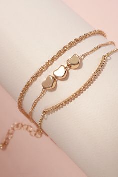 Multi-Layer Movable Mini Heart Oval Bar Bracelet, a stylish and this bracelet features multiple delicate layers adorned with movable mini heart and oval bar charms, creating a dynamic and elegant look. DIMENSIONlength: 7.5"ext: 2"clasp: Lobster Clawmetal finish: Gold Platingproduct: Lead & Nickel Compliantanti-tarnish: Double E-coating Steel Necklace, Sunglass Chain, Bow Earrings, Station Necklace, Mini Heart, Gold Butterfly, Bar Bracelets, Color Calibration, Monogram Initials