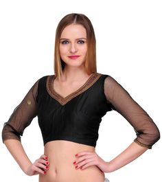 "Black saree blouse in cotton silk fabric with metallic trim at neckline and banarsi net see through sleeves. Can be paired with any sari for a party or formal look. Lined with pure cotton fabric for a comfortable fit along with back hook eye closure. Size: S- Bust-36\", Waist-31\", Shoulder-14\", Length-15.5\", Sleeve-6\" Size: M- Bust-39\", Waist-33\", Shoulder-14.5\",\" Length-15.5\", Sleeve-6.25\" Size: L- Bust-41\", Waist-34\", Shoulder-15\", , Length-15.5\", Sleeve-6.5\" Size: XL- Bust-43\ Festive Blouse With Sheer Dupatta For Eid, Georgette V-neck Blouse With Zari Work, Festive Anarkali Top With Sheer Dupatta, Fitted Silk Blouse With Sheer Dupatta, Party Cotton Silk Blouse Piece With Resham Embroidery, Party Blouse Piece With Resham Embroidery In Cotton Silk, Cotton Silk Blouse Piece With Resham Embroidery For Party, Traditional Festive Tops With Sheer Dupatta, Elegant Tops With Sheer Dupatta For Diwali