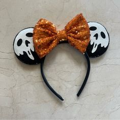 Minnie And Micky Halloween Themed Sequin Ears Headband Is Brand New And Still With Original Bag. Cute Ghost Theme. Orange Sequined. Priced To Sell And Will Ship Out Same Day As Purchased. Open To Offers On All Items. 2521 Halloween Costume Accessories With Ears, Themed Halloween Costume Accessories With Ears, Halloween Themed Cat Ears Headband, Halloween Costume Accessories: Ear Headband, Halloween Novelty Costume Accessories With Ears, Cute Halloween Party Headband, Halloween Costume Accessories: Ears Headband, Halloween Costume Accessories Headband With Ears, Novelty Halloween Costume Ears