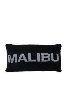 a black and white pillow with the word mallbu on it's front side