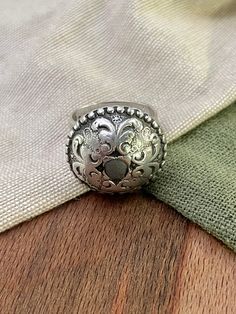 This style is one of our best seller. A nice example. Whether you're seeking a memorable gift for a loved one or looking to treat yourself to a timeless piece of jewelry, this Sterling Silver Ring is a perfect choice. Measurement: Size 8 P   Metal Purity: 925   Markings: 925   Weight: 8 Grams Antique Dome Ring With Polished Finish As Gift, Antique Polished Dome Ring Gift, Antique Dome Ring With Polished Finish, Vintage Sterling Silver Engraved Dome Ring, Antique Silver Engraved Ring With Oxidized Finish For Anniversary, Silver Dome Ring As Gift, Vintage Engraved Sterling Silver Dome Ring, Vintage White Gold Sterling Silver Dome Ring, Silver Dome Ring Gift