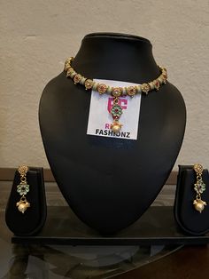 A light green Rajwadi necklace typically features intricate design work with traditional motifs.it may incorporate red gemstones and beads along with gold elements.The style is often inspired by traditional Indian jewelry craftsmanship,reflecting cultural aesthetic. 🌟 Key Features: Rajwadi Splendor: This necklace embodies the grandeur of Rajwadi design, featuring intricate patterns and motifs that have been cherished through generations. Serene Light Green Hue: The soft, light green color of the necklace adds a touch of tranquility and elegance, making it a perfect accessory for any occasion. Versatile Elegance: Whether adorning a bridal ensemble or enhancing your everyday attire, this necklace is a statement piece that transcends trends. 🌺 Why Choose Our Light Green Rajwadi Necklace? Cu Traditional Green Bridal Necklace With Stone Work, Traditional Green Kundan Necklace For Celebrations, Green Kundan Necklace For Diwali Rituals, Festive Green Kundan Necklace For Rituals, Multicolor Stone Work Necklace For Rituals, Green Temple Jewelry Necklace For Festivals, Festive Green Traditional Bridal Necklace, Festive Traditional Green Bridal Necklace, Green Bollywood Kundan Necklace For Rituals