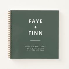 a green wedding guest book with the words faye and finnn printed on it