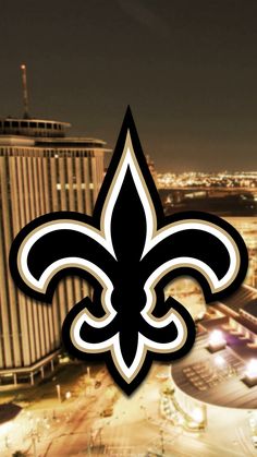 the new orleans saints logo is seen in front of an aerial view of las vegas