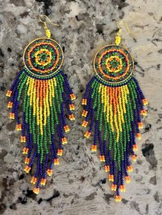 This lovely pair of beaded earrings scream vacation! These bold colors and vibrant hues make statement with any outfit or swimwear! they can be worn day or night and make a perfect addition to your jewelry collection! Embroidery Jewelry, Beaded Dangle Earrings, Etsy Earrings Dangle, Beaded Dangles, Scream, Bold Colors, Beaded Earrings, Jewelry Earrings Dangle, Jewelry Collection