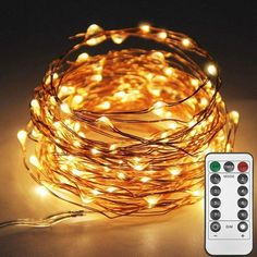 a string of lights with remote controls on the side