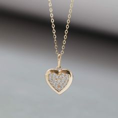 "14K Solid Gold Necklace Heart Pendant Necklace Diamond Necklace Minimalist Jewellery Dainty Necklace for Women Necklace for Girls Embrace the symbol of love and elegance with our 14K Solid Gold Heart Pendant Necklace. This dainty and minimalist jewelry piece showcases a stunning design of a heart pendant, with diamonds of Cubic Zirconia, adding a touch of sparkle to any outfit. Perfect for women and girls, it's a timeless and cherished accessory that effortlessly enhances your beauty. * Materials: 14K Solid Gold (AU585), Cubic Zirconia  * Dimensions: Length of the pendant 15mm, Heart: 10.3*9.3mm, Chain 45cm * Care: \"I am a dainty 14K solid gold necklace. Please be gentle and handle with extra care. ♡\" ♡ The item is a perfect gift for different occasions and purposes, such as a Birthday Delicate Heart Cut Clavicle Chain Jewelry, 14k Gold Pendant Charm Necklace For Valentine's Day, 14k Gold Clavicle Chain Necklace For Valentine's Day, 14k Gold Necklace For Valentine's Day, Minimalist Heart Charm Jewelry For Anniversary, Minimalist Heart Charm Jewelry For Anniversary Gift, Delicate Rose Gold Heart Pendant Necklace, Valentine's Day 14k Gold Pendant Necklace, Valentine's Day Heart Necklace With Clavicle Chain