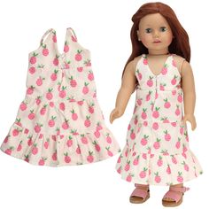 a doll is wearing a dress with pineapples on the front and bottom, as well as pink shoes