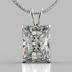 This gorgeous solitaire pendant features a new and improved cut, much more brilliant than the traditional emerald cut, Swarovski cubic zirconia stone set in four-prong basket setting. Available in 14K white gold, 14K yellow gold, or 14K rose gold. 1 carat = 6mm x 4mm 1.5 carat = 7mm x 5mm 2 carat = 8mm x 6mm Chain is not included. Available in our store: https://www.etsy.com/listing/1101432451/diamond-cut-cable-chain-10mm-in-white?ref=shop_home_active_1&frs=1 Visit our store: https://www.ets Tiffany Style Engagement Ring, Engagement Rings Sale, Radiant Cut Diamond, Free Earrings, Solitaire Pendant, Radiant Cut, Womens Wedding Bands, Bridal Necklace, Designer Engagement Rings