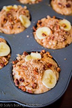 banana and walnut muffins in a muffin tin