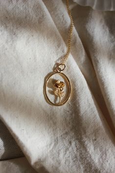 A golden garden where blooms last forever. Detailed rose with leaves in a golden frame. Pendant measures approximately 1" Gold vermeil 18" gold fill chain Rose Pendant Gold, Nice Gold Jewelry, Gold Rose Pendant, Flower Gold Pendant, Rose Necklace Aesthetic, Golden Necklace Aesthetic, Cute Gold Necklace, Rose Necklace Gold, Pendant Aesthetic