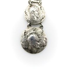 This is part of Chairish’s Costume Jewelry assortment.  This sterling silver fob features four graduated homeric medallions, dangling from a dog clip. Designed by George Shiebler, circa 1890’s, the piece was originally a watch fob; in contemporary use it makes a dramatic pendant when worn on a chain, or is great for a modern day watch enthusiast. The medallions are hand-hammered, with an ancient and cracked look to them—meant to make the piece look like it had come out of the many archaeological Collectible Historical Jewelry With Antique Finish, Collectible Antique Finish Historical Jewelry, Victorian Silver Coin Pendant Jewelry, Historical Silver Jewelry As A Gift, Sterling Silver Medallion Jewelry With Antique Finish, Antique Silver Coin Pendant Jewelry, Antique Silver Jewelry With Coin Pendant, Antique Coin Jewelry With Oxidized Finish, Vintage Antique Silver Jewelry With Coin Pendant