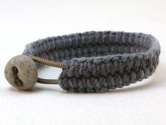 "A subdued blend of navy and dark grey cotton are hand loomed into this slender cuff. Tapered edges lay flat. A handsome addition to any wardrobe. Secured with a granite clay button and loop. 7\" (178 mm) inside circumference 5/8\" (16 mm) wide There is only one of these available in this particular combination of color and size so if you want this but it's not quite right for you please ask to have something custom made. This unique design is one of a series of slender hand loomed bracelets. Se Casual Gray Bracelets For Everyday, Handmade Gray Bracelets For Everyday, Everyday Handmade Gray Bracelets, Handmade Casual Gray Bracelets, Handmade Casual Gray Bracelet, Casual Handmade Gray Bracelets, Casual Gray Handmade Bracelet, Sailor Knot Bracelet, Sailor Bracelet