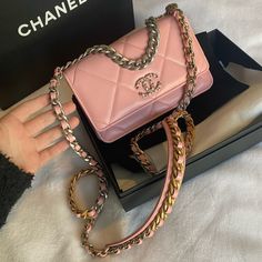 Chanel 19 Wallet On Chain In Brand New Condition Never Used! Authenticated By Poshmark Upon Purchase Comes With Box, Dust Bag, Dust Cover, And Bag Free Shipping Pink Leather With Gold/Silver Hardware I Answer All And Any Questions Asked! Pictures Are Taken Before Each Item Is Sent To Buyer To Insure Honesty Between Sales! Thank You For Checking Out My Closet Chanel Bags For Sale, High-end Pink Rectangular Bag, High-end Pink Crossbody Shoulder Bag, High-end Pink Shoulder Bag With Detachable Strap, Designer Wallet On Chain With Detachable Strap, Luxury Pink Square Bag, Luxury Pink Square Bags, Pink Rectangular Bag, Pink Luxury Square Shoulder Bag