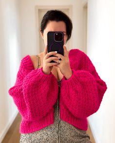 Add a touch of whimsy and warmth to your wardrobe with this delightful hand-knitted pink crop cardigan. Expertly crafted with love and attention to detail, this unique piece features a beautiful textured pattern that sets it apart from the rest. Features: Hand-Knitted: Each cardigan is meticulously hand-knitted, ensuring high quality and a personal touch. Beautiful Texture: The intricate textured pattern adds depth and visual interest. Perfect Crop Length: Ideal for layering over dresses, high-waisted jeans, or skirts for a trendy look. Soft and Cozy: Made from soft, high-quality yarn, this cardigan is as comfortable as it is stylish. Versatile Style: The lovely pink hue complements a variety of outfits, making it a versatile addition to your wardrobe. Whether you're dressing up for a spec Pink Oversized Cropped Sweater For Winter, Oversized Pink Cropped Sweater For Winter, Pink Balloon Sleeve Sweater For Winter, Pink Trendy Cropped Knit Sweater, Trendy Pink Cropped Knit Sweater, Cozy Pink Cropped Sweater For Winter, Pink Chunky Knit Cropped Sweater For Fall, Winter Cropped Pink Sweater, Pink Cropped Sweater For Winter