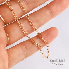 This gold paperclip chain necklace will be your new go-to necklace! We love to wear this minimalist necklace with other necklaces to layer or alone as a statement necklace! You can also wear it as a choker necklace in a shorter length. Gold filled necklace Nickel-free Choose from 2 styles of chains Small Link Chain: Link Size - 2.5 x 6 mm Spring ring Large Link Chain: Link Size - 3.7 x 13.2 mm Lobster claw No jump ring attached Minimalist Paperclip Chain Necklace As Gift, Minimalist Paperclip Chain Necklace For Gift, Minimalist Paperclip Chain Necklace Gift, Everyday 14k Gold Filled Paperclip Chain Necklace, Simple Paperclip Chain Necklace As Gift, Simple Paperclip Chain Necklace Gift, Simple Everyday Paperclip Chain Jewelry, Simple Everyday Paperclip Chain Necklace, Minimalist 14k Gold Paperclip Chain Jewelry