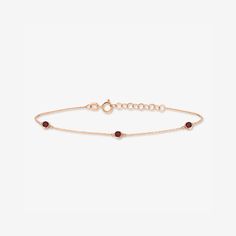 With this 14K gold Ruby Station Bracelet, now your birthstone can decorate your wrist! - Handcrafted in 14k solid gold set with a high-quality natural emerald gemstone.- Chain length is adjustable from 6 to 7 inches.- Bead height: 5 mm.- Bead width: 5 mm.- 100% US sourced. 1 2 14k Solid GoldMade of long lasting, nature friendly recycled gold. 14k gold does not oxidize or discolor making it a perfect option for daily wear. Symbol Of Hope, Station Bracelet, Nature Friendly, Gold Bracelets, Emerald Gemstone, Recycled Gold, Natural Emerald, Gold Set, Chain Lengths