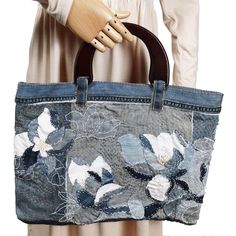 Hand-made up-cycled jeans bag made by Dorothy Cherbavaz in the US Handmade Denim Tote Shoulder Bag, Handmade Rectangular Recycled Denim Bag, Everyday Handmade Recycled Denim Bag, Handmade Everyday Bag In Recycled Denim, Handmade Everyday Bags From Recycled Denim, Handmade Recycled Denim Shoulder Bag, Handmade Recycled Denim Shoulder Bag For Daily Use, Handmade Denim Blue Tote Shoulder Bag, Vintage Upcycled Denim Bag