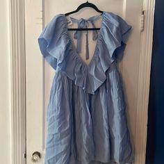 This One Is (I Believe) From The Marshall’s Junior / Cube Section. It Is So Cute, Just A Little Short If You’re A Tall Gal Like Me (I’m 5’10 And It Was A Little Too Babydoll-Ish). Never Worn, Tried On Once Flirty Blue Beach Dress, Light Blue Tie Back Summer Dress, Light Blue Summer Sundress For Party, Blue Flirty Dress With Tie Back, Summer Party Sundress In Light Blue, Blue V-neck Mini Dress With Tie Back, Light Blue Summer Dress With Tie Back, Flirty Flowy Blue Mini Dress, Chic Blue Backless Sundress