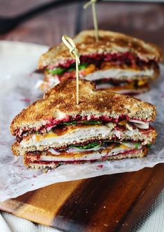 two grilled sandwiches with the words 9 things to do with your thanksgiving leftovers