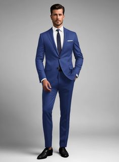 If you are looking for a suit that combines classic elegance with modern style, look no further than our Scabal Egyptian Blue Wool suit. Crafted from 100% wool, the suit being light weight enhances breathability and comfort while the versatility of its hue makes it an ideal wear for any occasion. Pair it with a matching waistcoat, white shirt, black patterned tie and tan brogue shoes for a snazzy finish.  Look Includes   Scabal Egyptian Blue Wool Fabric  Two Button Jacket Style  Notch Lapel  Horn Royal Black Buttons  Single Vent  Three Cuff Buttons  Two Welted Back Pockets on Trousers   Click 'Customize Now' to modify the look if needed.  Lining: 100% Viscose, Dry Clean. Tie With Blue Suit Men, Men’s Navy Blue Suit, Blue Suit Black Tie, Blue Suit Shoes, Md Shoes, Blue Suit Tie, Blue Suit Outfit, Egyptian Blue, Light Blue Suit