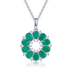 Introducing our Round Emerald Necklace Silver, a stunning piece of jewelry perfect for gifting on special occasions like birthdays, anniversaries, or as a thoughtful present for your wife. This exquisite necklace features a captivating circular pendant design. At its center lies a circle of tiny white zircon stones, delicately set in prong settings to enhance their brilliance. Surrounding this inner circle are ten natural Zambian emerald gemstones, each showcasing their vibrant green hue in a 4 by 3 prong setting formation. Completing the design is another circle white zircon stones, adding a touch of elegance and sparkle to the pendant. The combination of the lush green emeralds and the shimmering white zircon accents creates a mesmerizing and eye-catching look. Crafted with high-quality Luxury Green Round Pendant Jewelry, Diamond White Cubic Zirconia Jewelry With Gemstone Accents, Exquisite Round May Birthstone Necklace, Dazzling Round Emerald Necklace, Crystal Jewelry For Anniversary, May Birthstone, Exquisite Gemstone Flower Pendant Necklace, Dazzling Emerald Necklace For Anniversary, Exquisite Oval Diamond Necklace Gift, Exquisite Oval Diamond Necklace For Gift