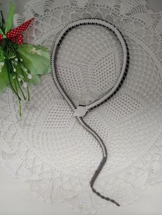 "A copy of a rare antique Turkish bead snake necklace from the 1910s-1920s. Necklace from Czech beads, crochet necklace, it is 100% handmade. Jewelry snake is super elastic and comfortable to wear. Replica Vintage snake with geometric pattern. The body is gray with black zigzags, the belly is white. The snake of the head slides through the loop to the tail. The necklace will emphasize your individuality, originality and uniqueness. It will be a great gift. The length of the snake necklace is 50 Bead Snake, Beige Necklace, Crochet Snake, Beads Long Necklace, 1920s Necklace, Snake Black, Beads Crochet, Necklace Snake, Necklace Gothic